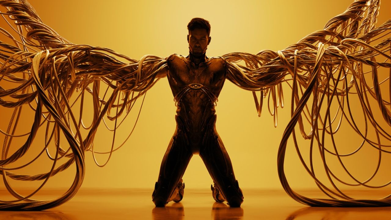Dynamic performer with flowing golden ribbons at Yalla Dubai.