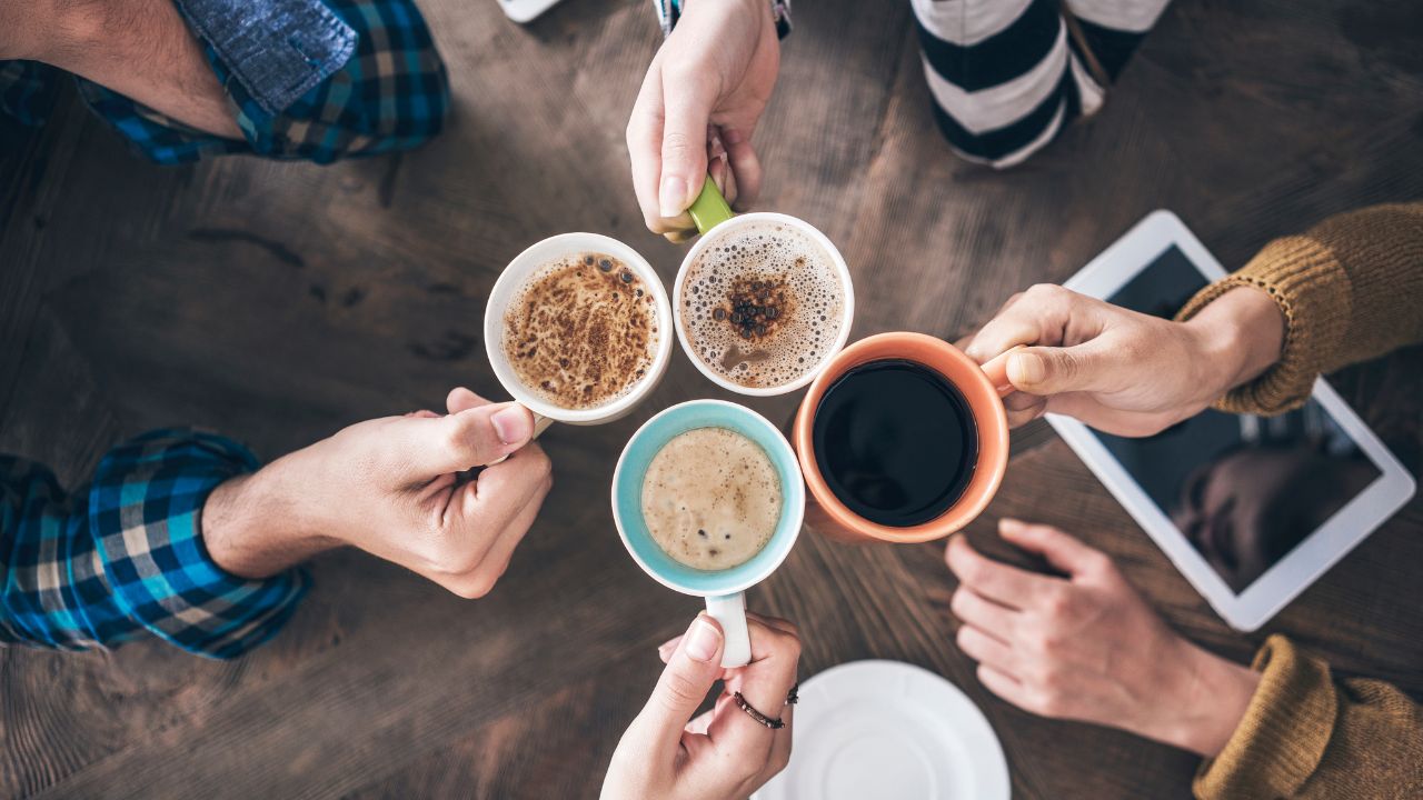 Group of people enjoying coffee together in Dubai.