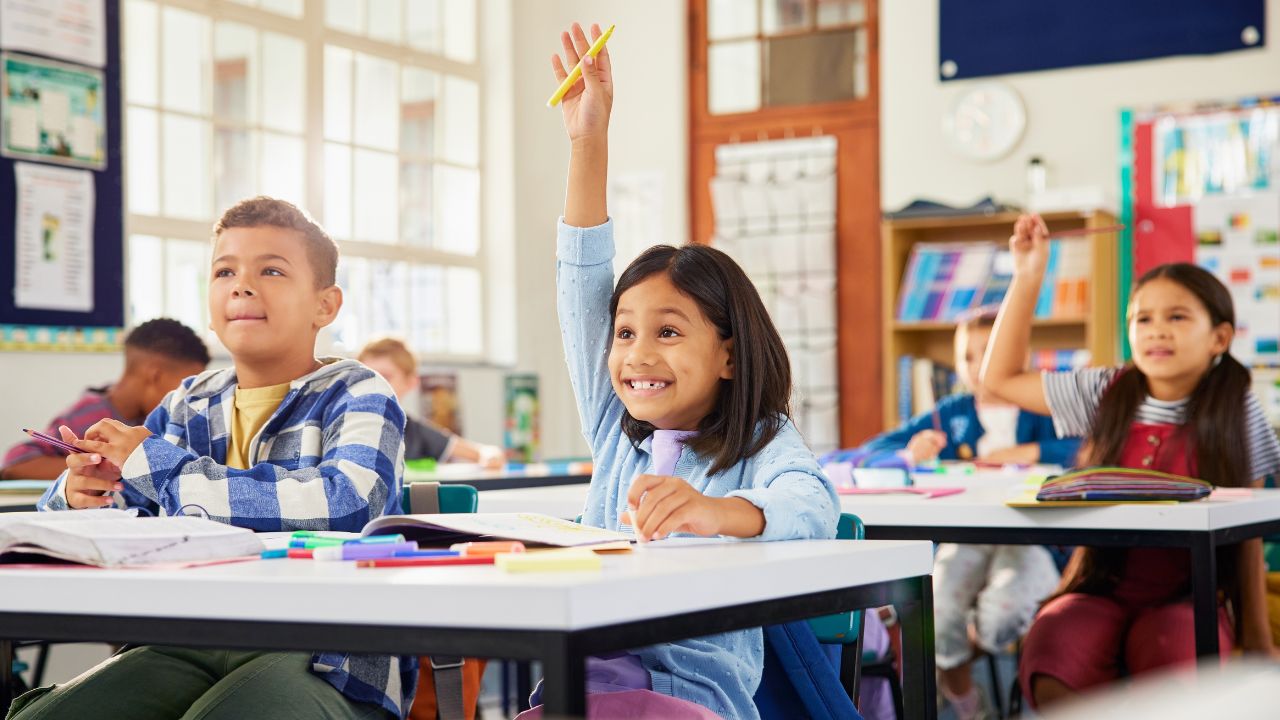 girl in class participating