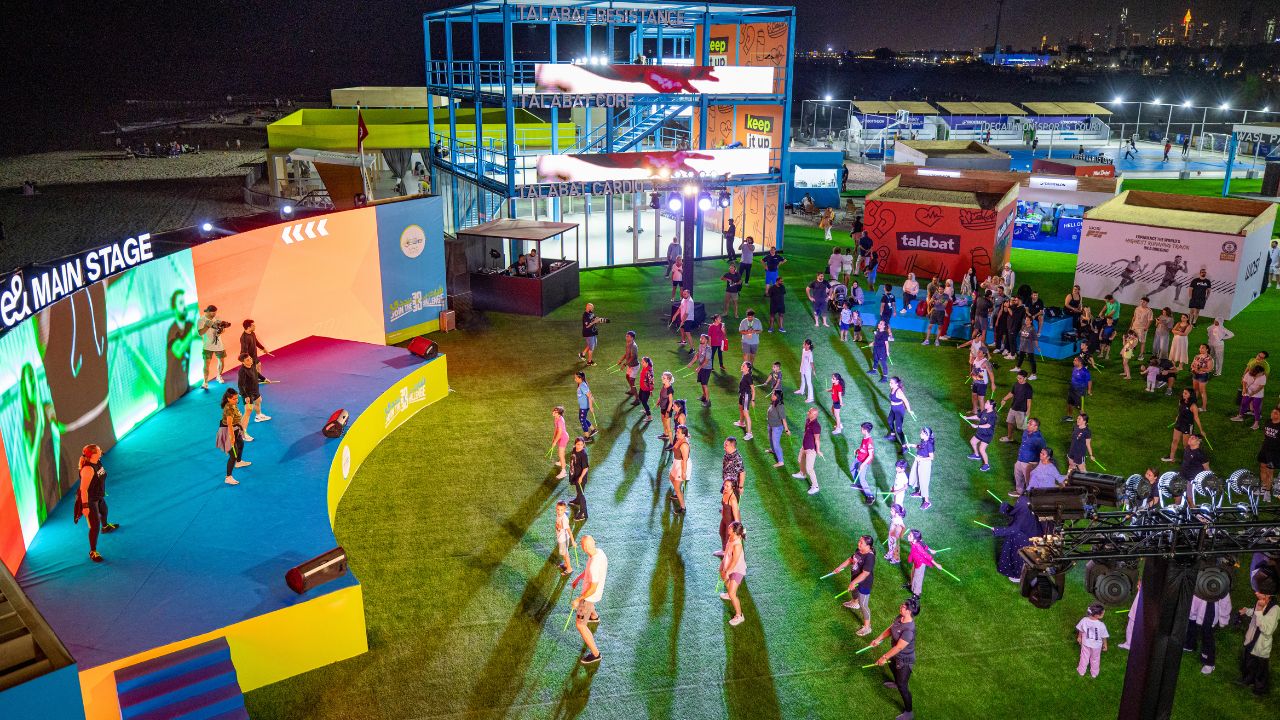People participating in Dubai Fitness Challenge 2025 outdoor event at Yalla Dubai Life.
