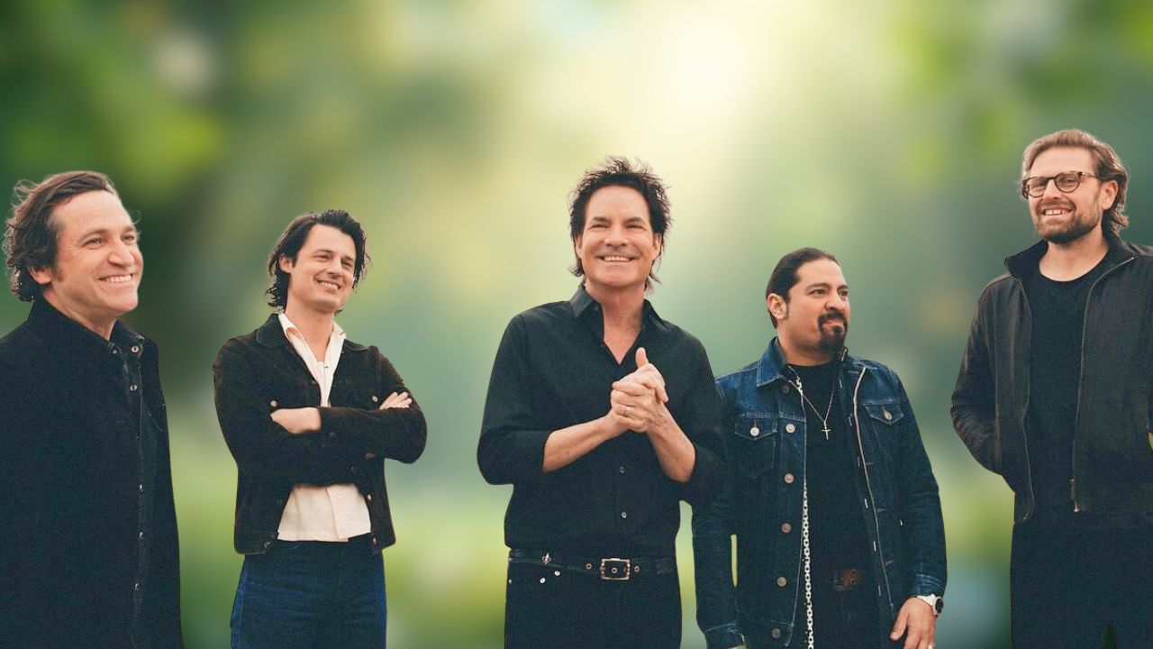 Iconic band Train performing outdoors in Dubai for a live concert.