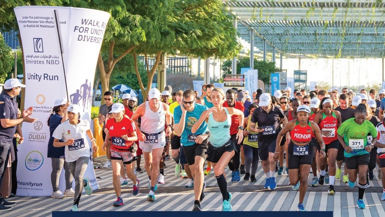 Runners at the Dubai Fitness Challenge 2025 Unity Run start line, ready to begin the race.