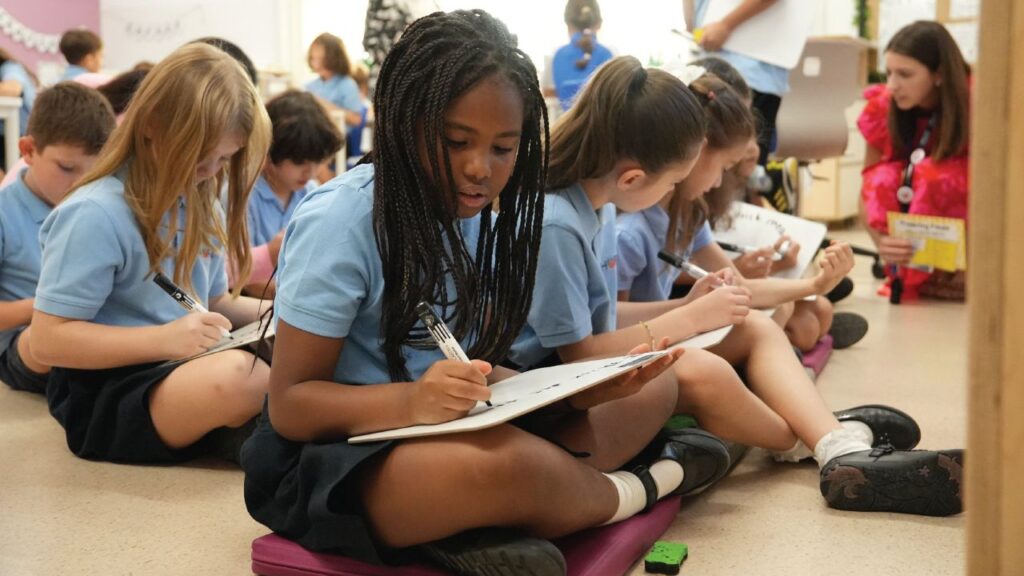 Children studying in a classroom at Horizon International School.