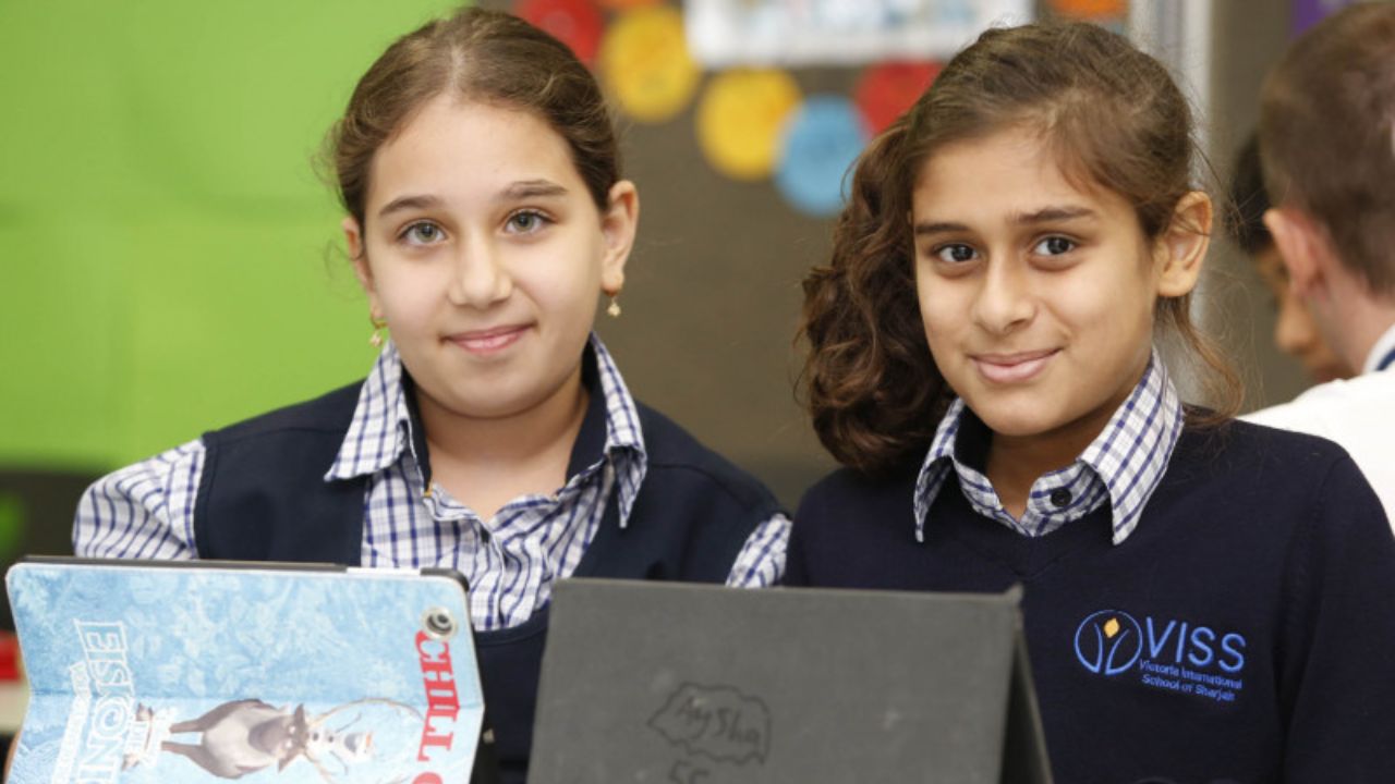 Students at Victoria International School of Sharjah, Dubai, engaging in classroom activities.