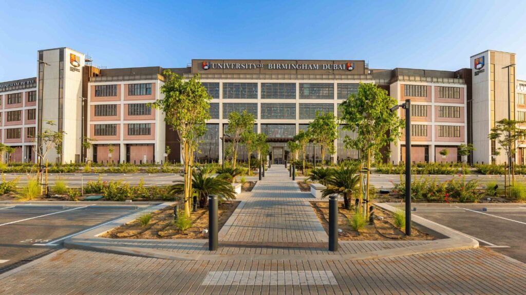 University of Birmingham Dubai campus with modern architecture and landscaped surroundings.