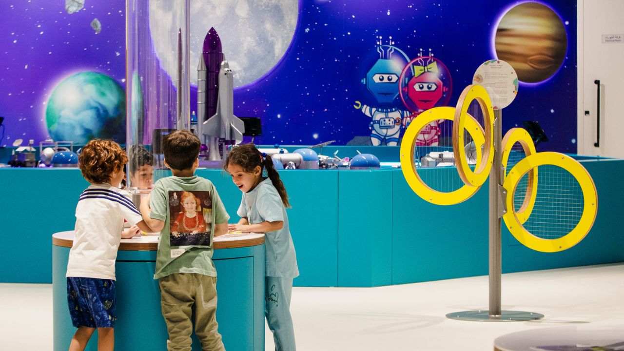Kids exploring space activities in a colourful, educational play zone.