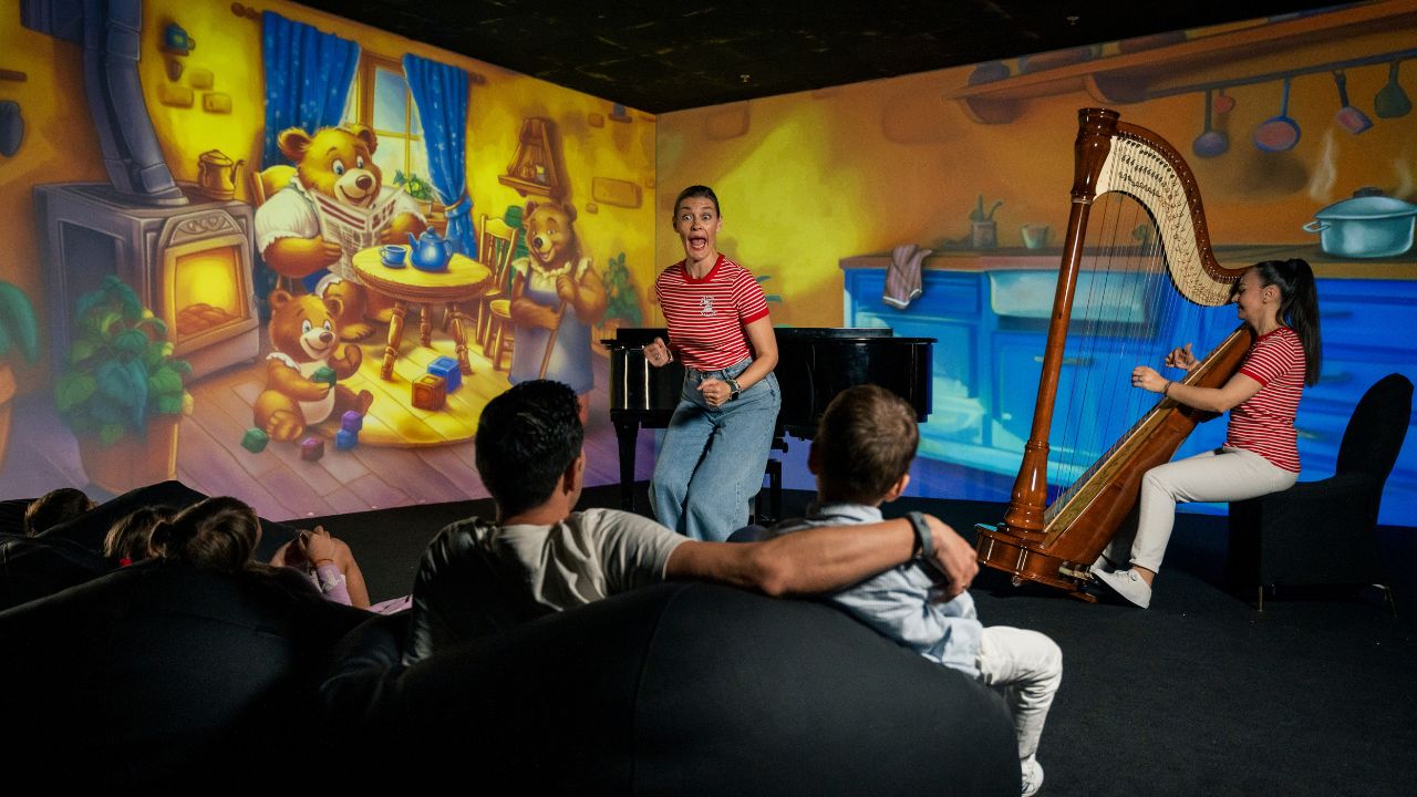 Children enjoying interactive entertainment at Yalla Dubai.
