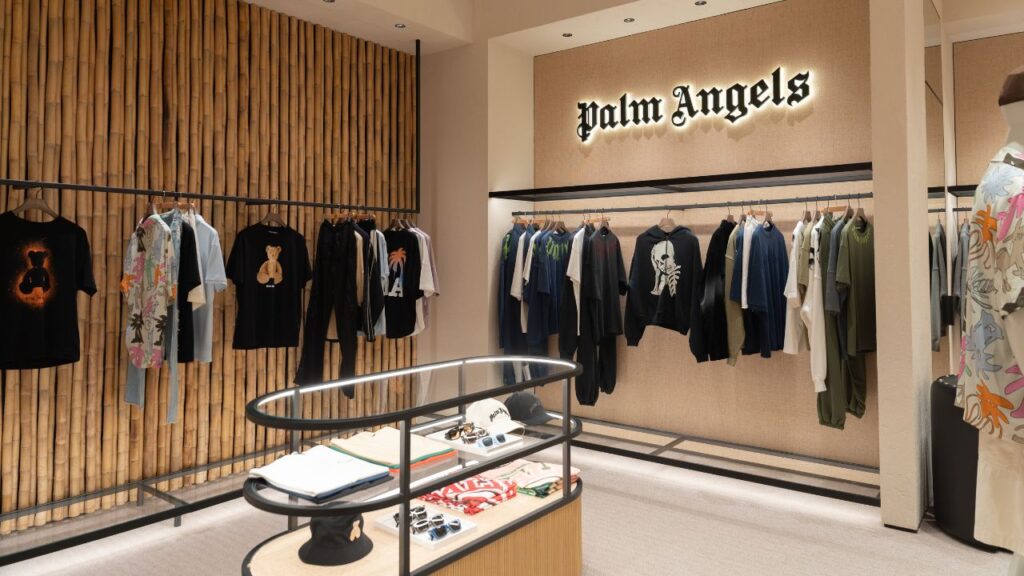 Modern clothing store interior at Yalla Dubai Life with stylish apparel display.