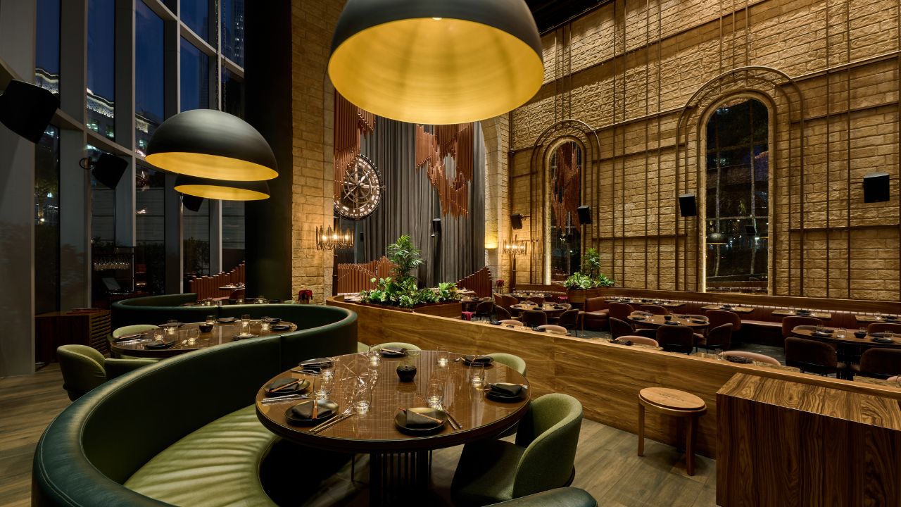 Stylish restaurant interior in Dubai with warm lighting and modern decor.
