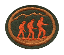 Beeing amde in the shape of a patch, depicting people hiking in nature with mountains in the background, embroidered in orange and black colors for outdoor activity enthusiasts.