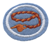 Rotes Knoten- und Taschenlampe-Emblem, gestickt auf blauer Filzfläche, symbolisiert Sicherheits- und Erkennungszeichen, geeignet für Uniformen und Auszeichnungen.