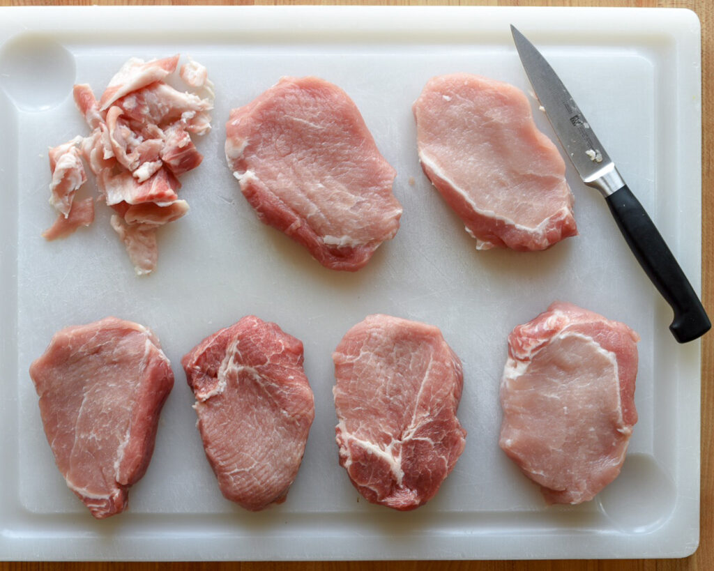 Six pork loin rib end boneless chops trimmed of all excess fat