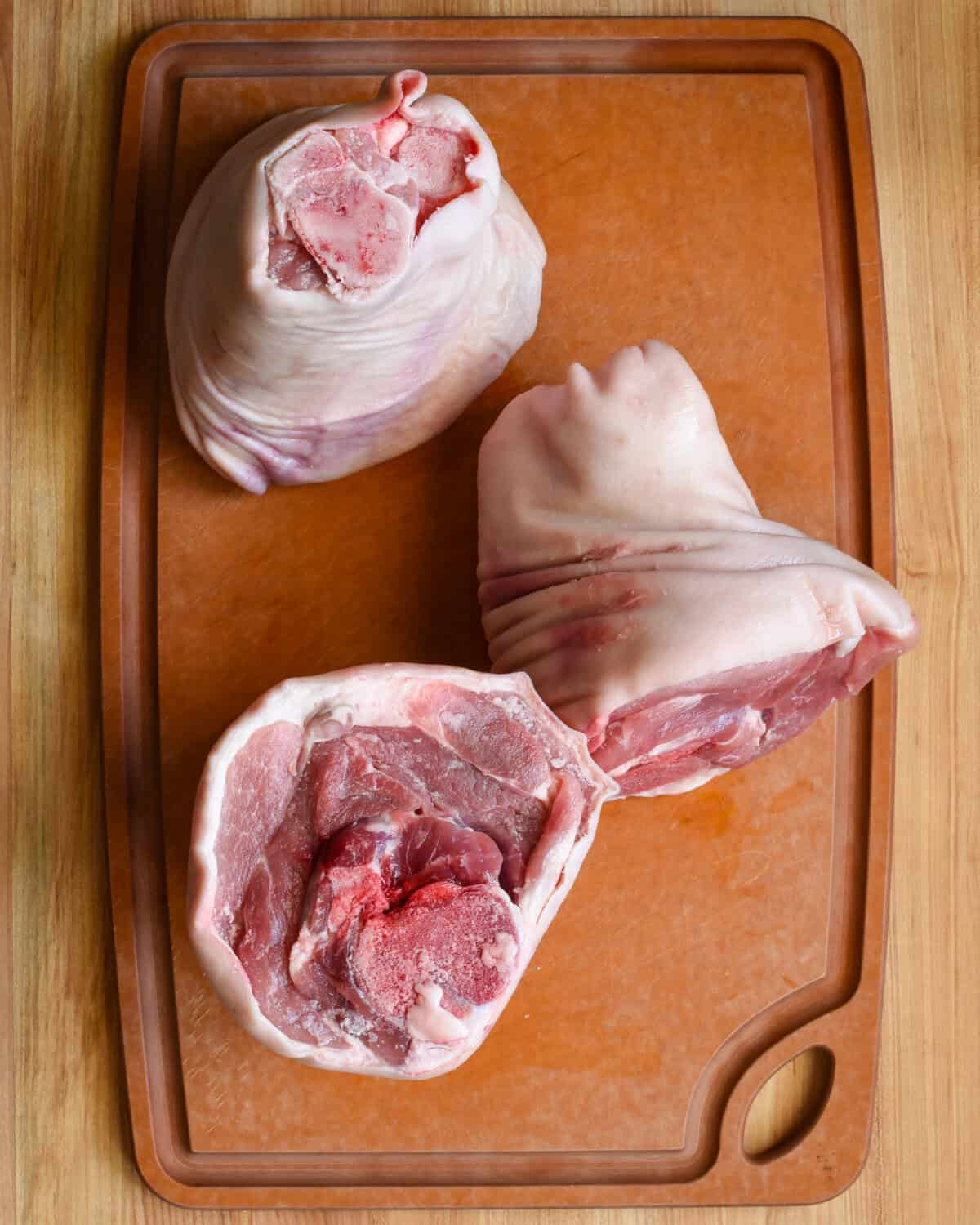 Three uncooked shanks.