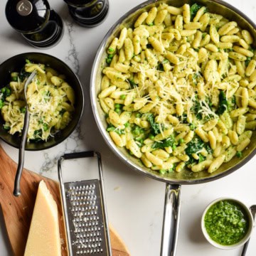 A skillet of pasta made using an easy basil pesto pasta recipe.