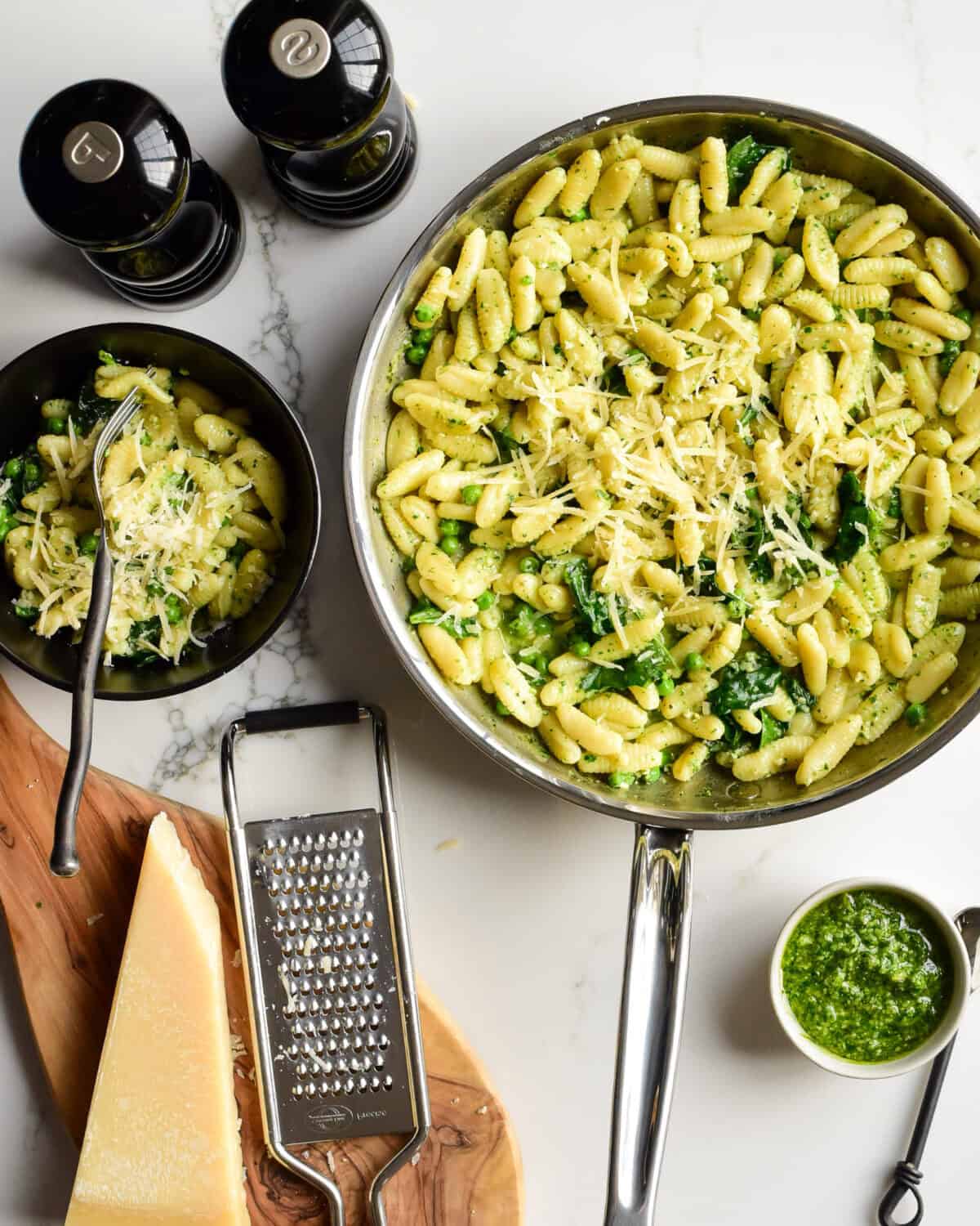 A skillet of pasta made using an easy basil pesto pasta recipe.