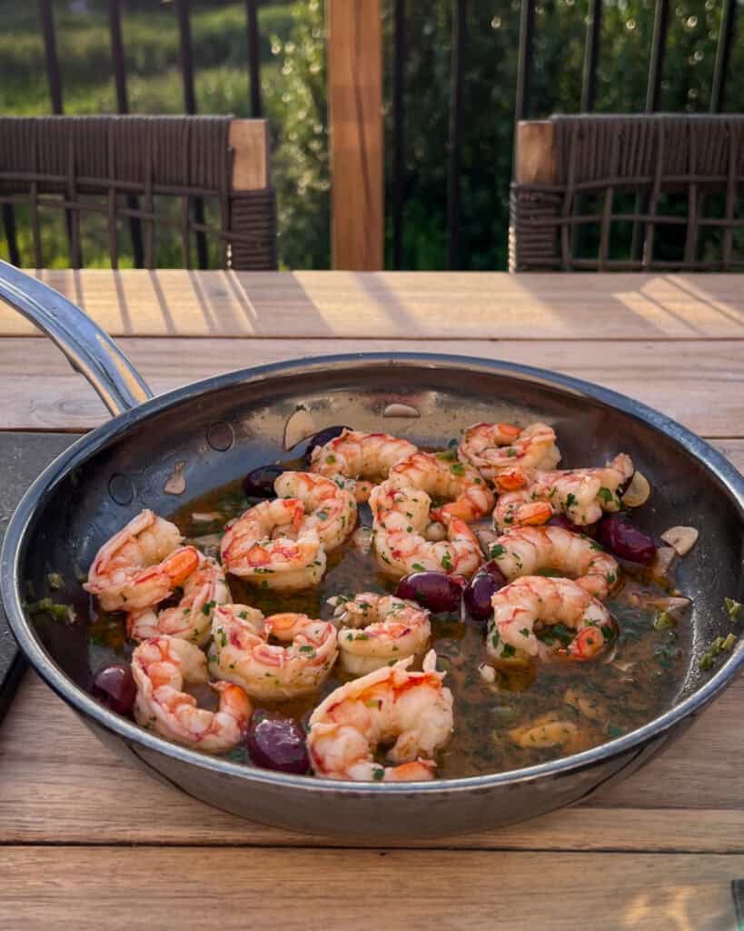 Gambas al Ajillo made with shells off and with Kalamata olives.