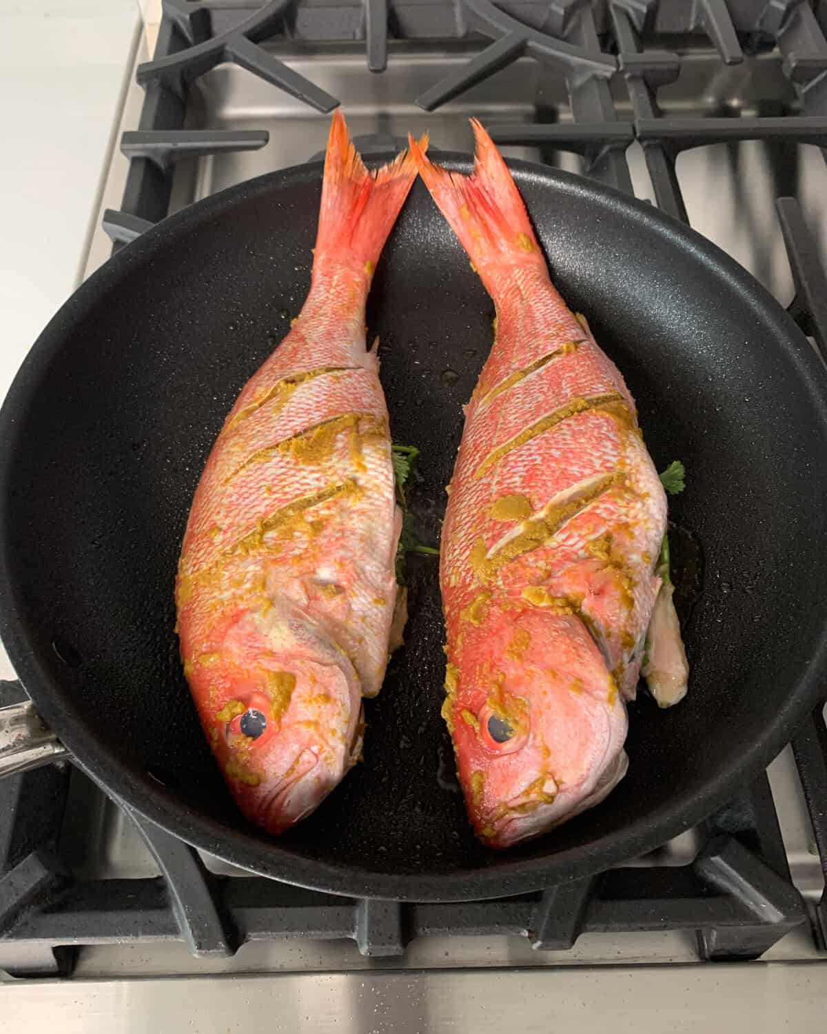 Prep and season the wild vermillion snapper.
