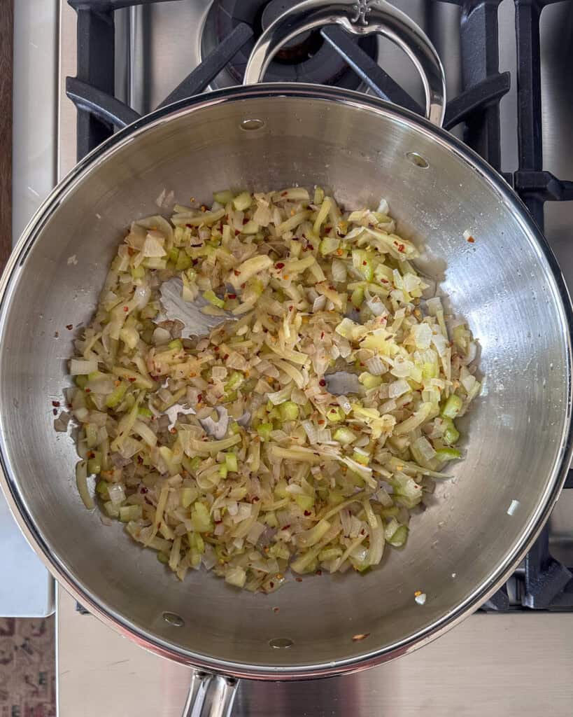 Sauté the onions and fennel until translucent.