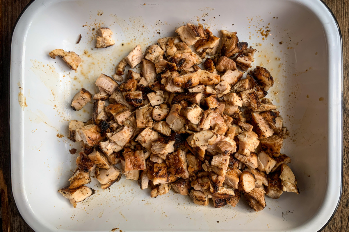 Grilled chicken thighs, cut into bite sized pieces for a Mexican chicken and corn chowder recipe.
