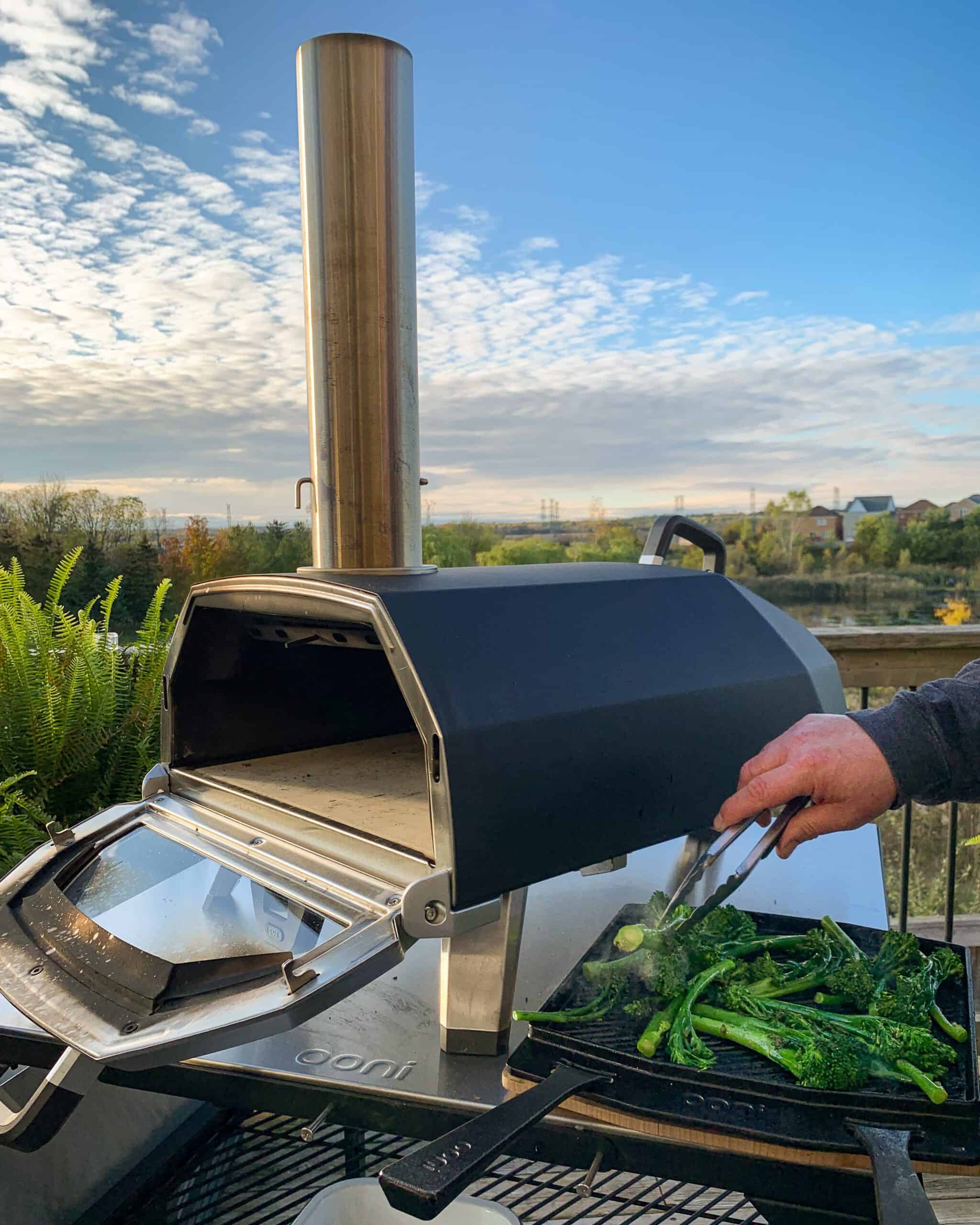 Roasting broccolini in my Ooni Karu 16 pizza oven on a beautiful evening.