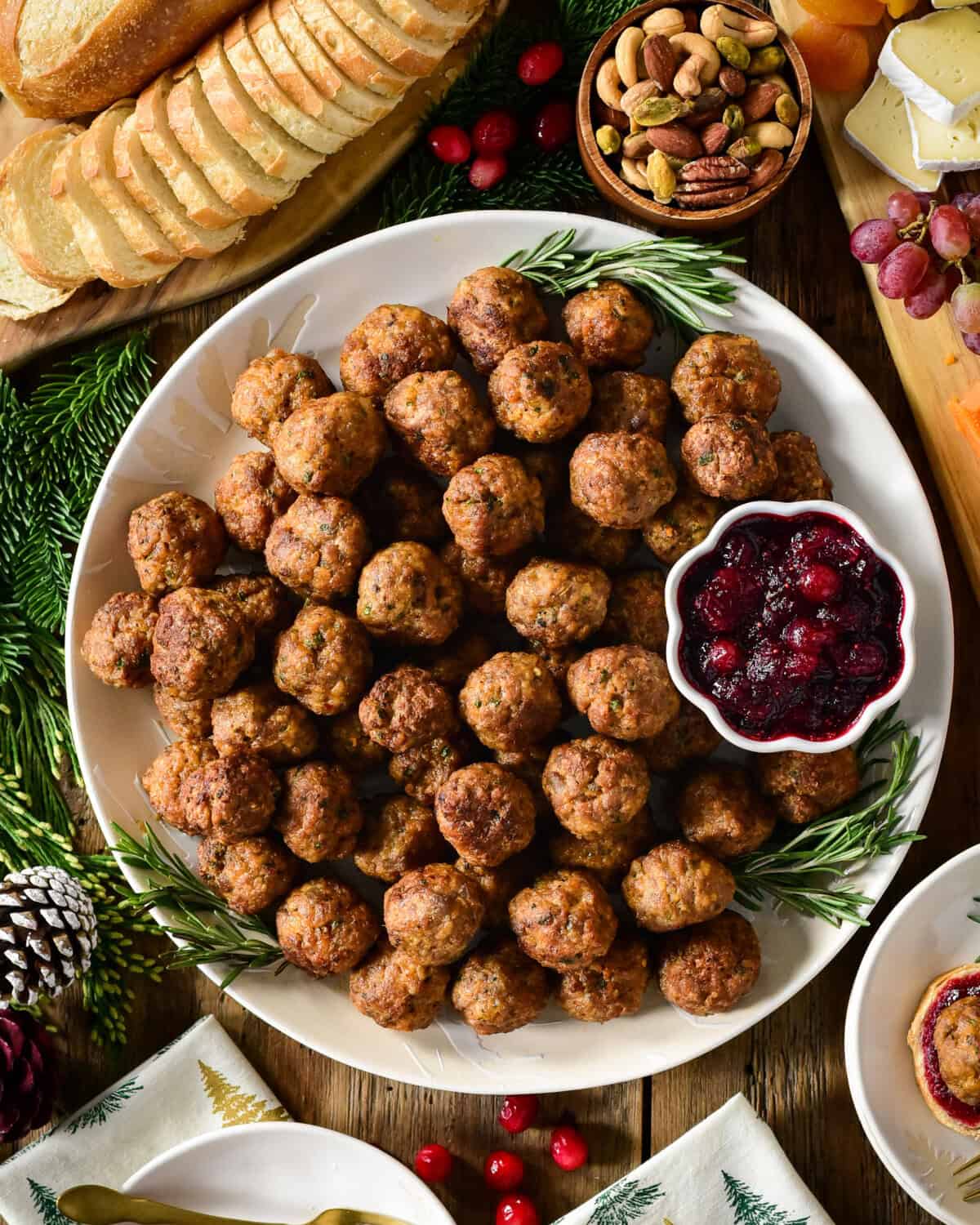 A platter of Air Fryer Sausage Meatballs with cranberry sauce.
