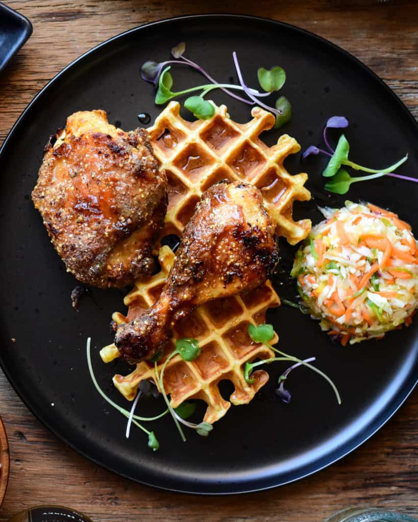 Air Fryer Chicken with Buttermilk Waffles plated with coleslaw