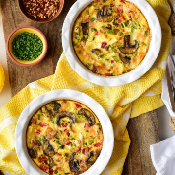 Crustless Quiche with Bacon, Mushrooms & Jalapenos served in two mini pie dishes.