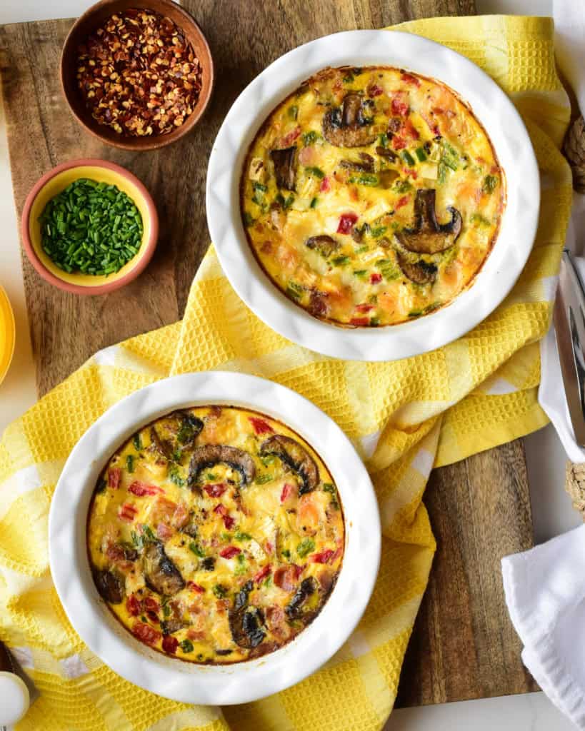 Crustless Quiche with Bacon, Mushrooms & Jalapenos served in two mini pie dishes.