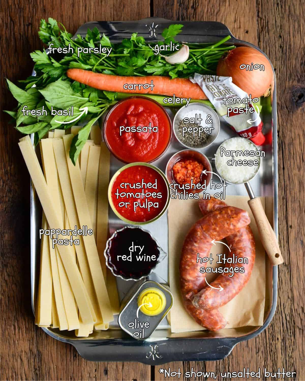 Ingredients for a sausage ragu recipe.