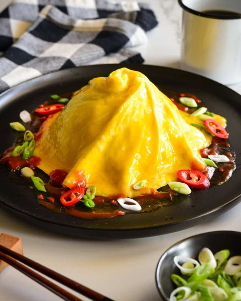 A Tornado Omelette (Omurice) with Sriracha Ketchup.