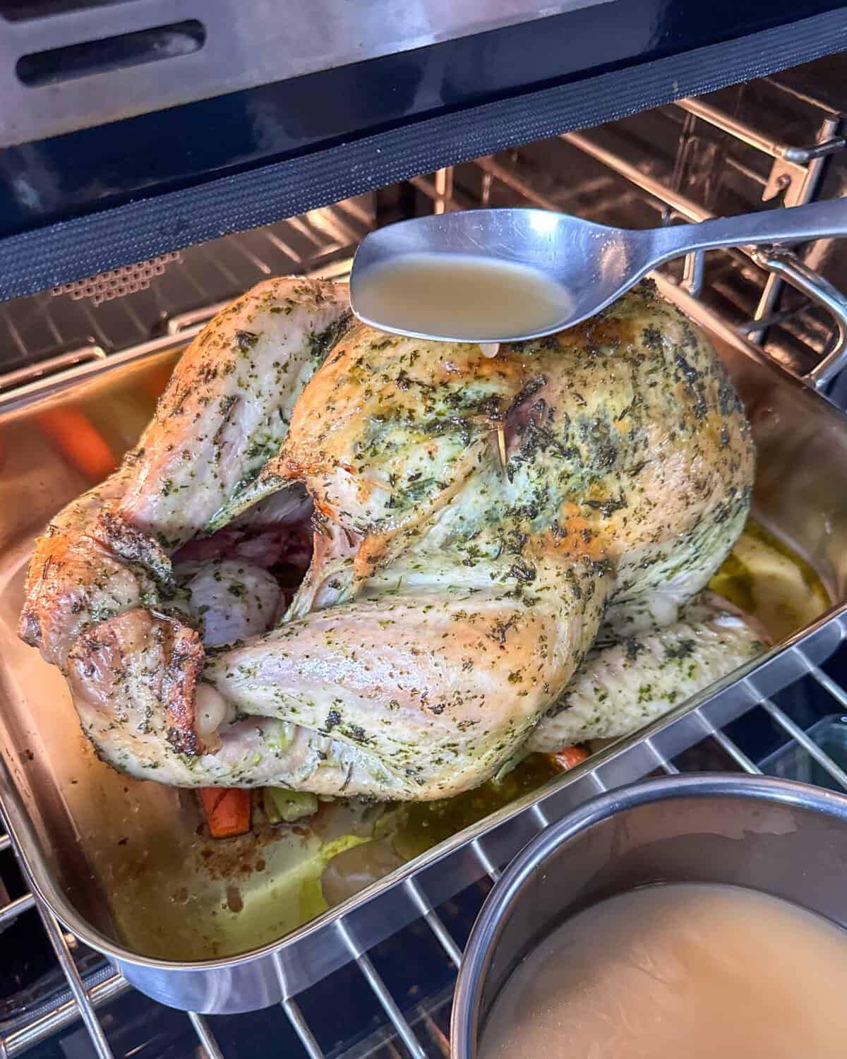 Baste the turkey with stock every 25 minutes.