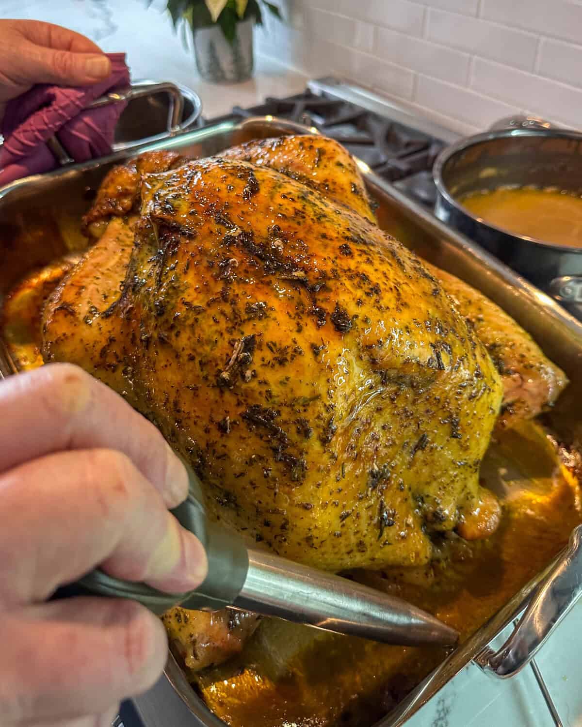 Baste the turkey with the drippings.