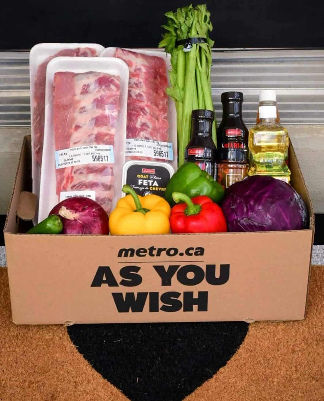 A delivery box of ingredients to make BBQ Baby Back Ribs with Psychedelic Slaw