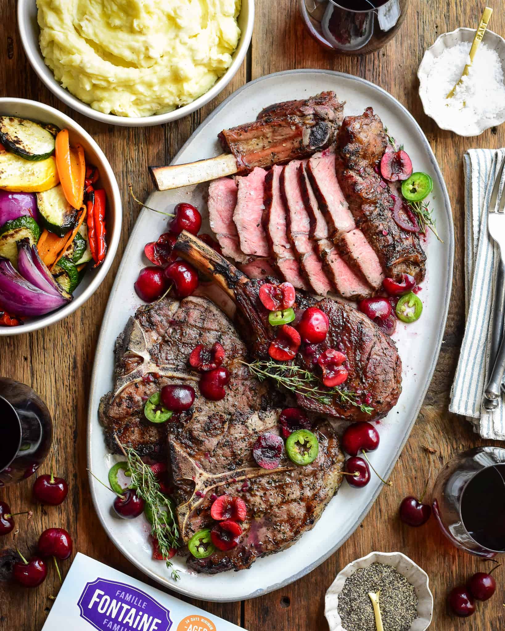 Grilled Veal Chops with a Cherry Jalapeño Sauce poured over top. Served with mashed potatoes and mixed grilled veggies.
