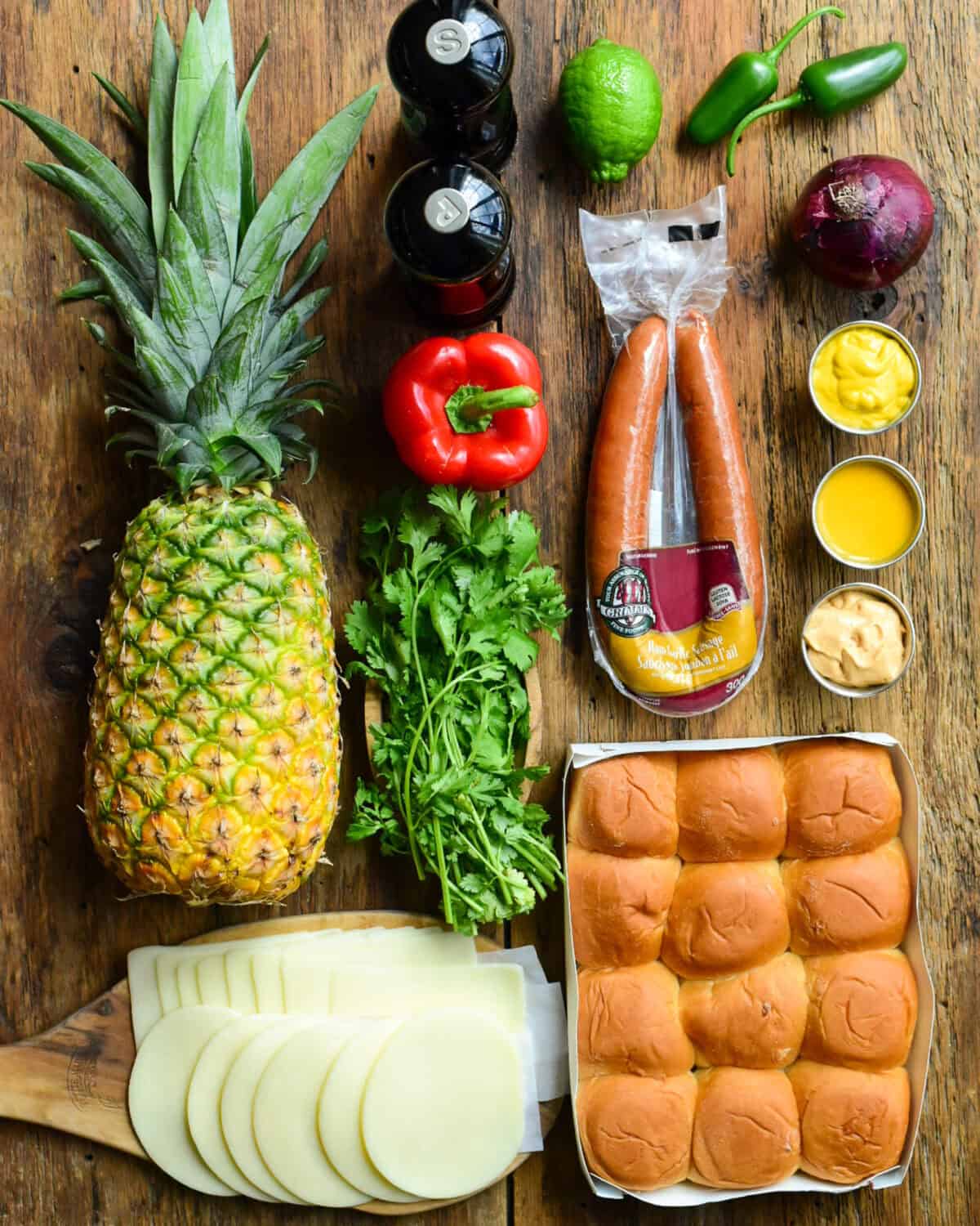 Ingredients laid out for sausage sliders.