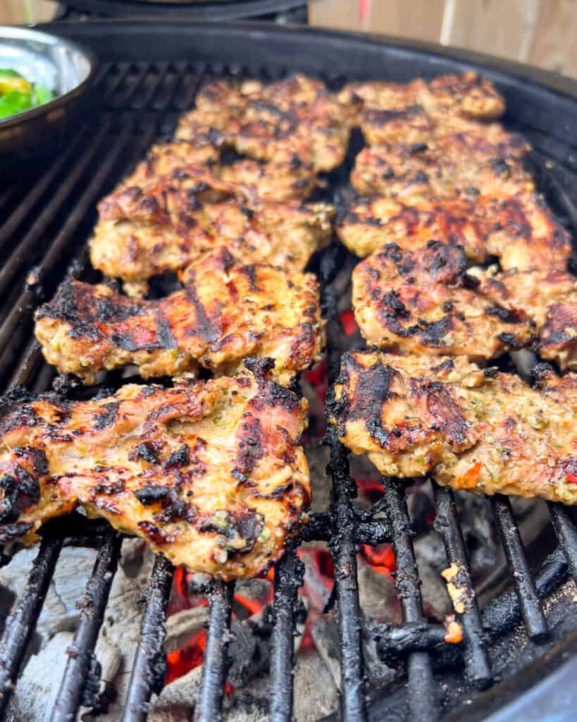 Grill the chicken over the direct heat until lightly charred on both sides and the internal temperature reaches 165°F or more.