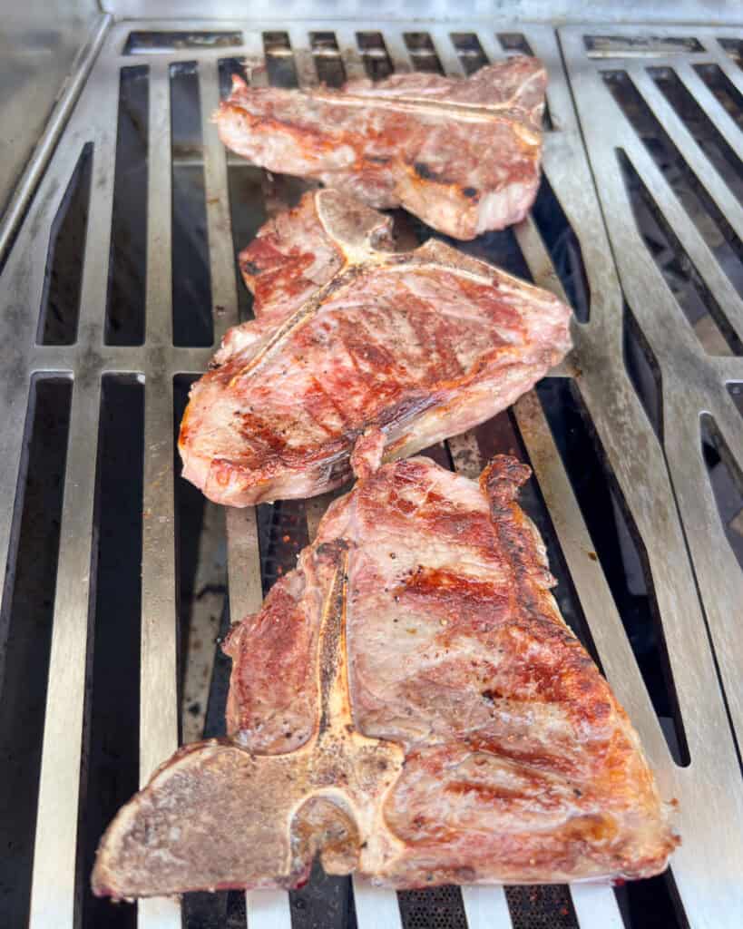 Sear until light grill-marks appear on veal chops.