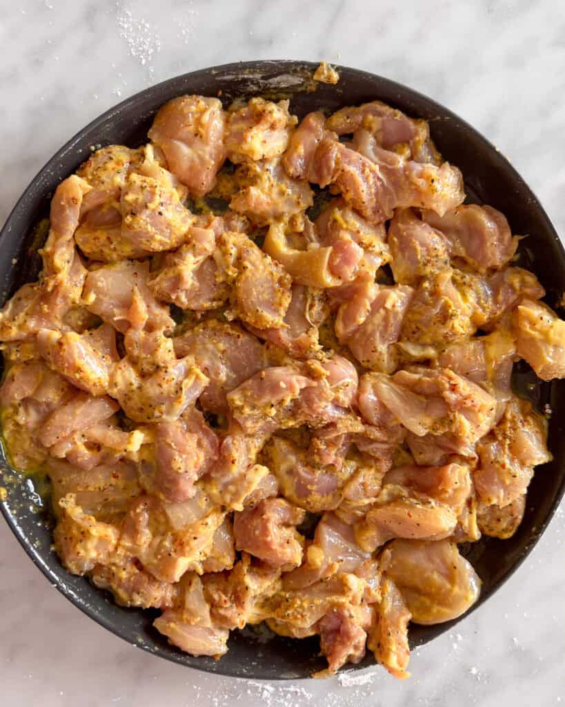 Corn starch is mixed into the chicken and egg.