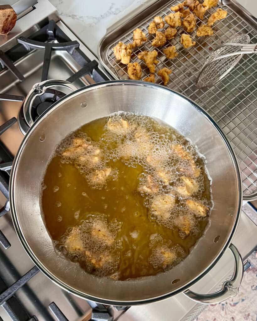 Fry the chicken pieces in batches so they don’t clump together. Fry until golden brown.