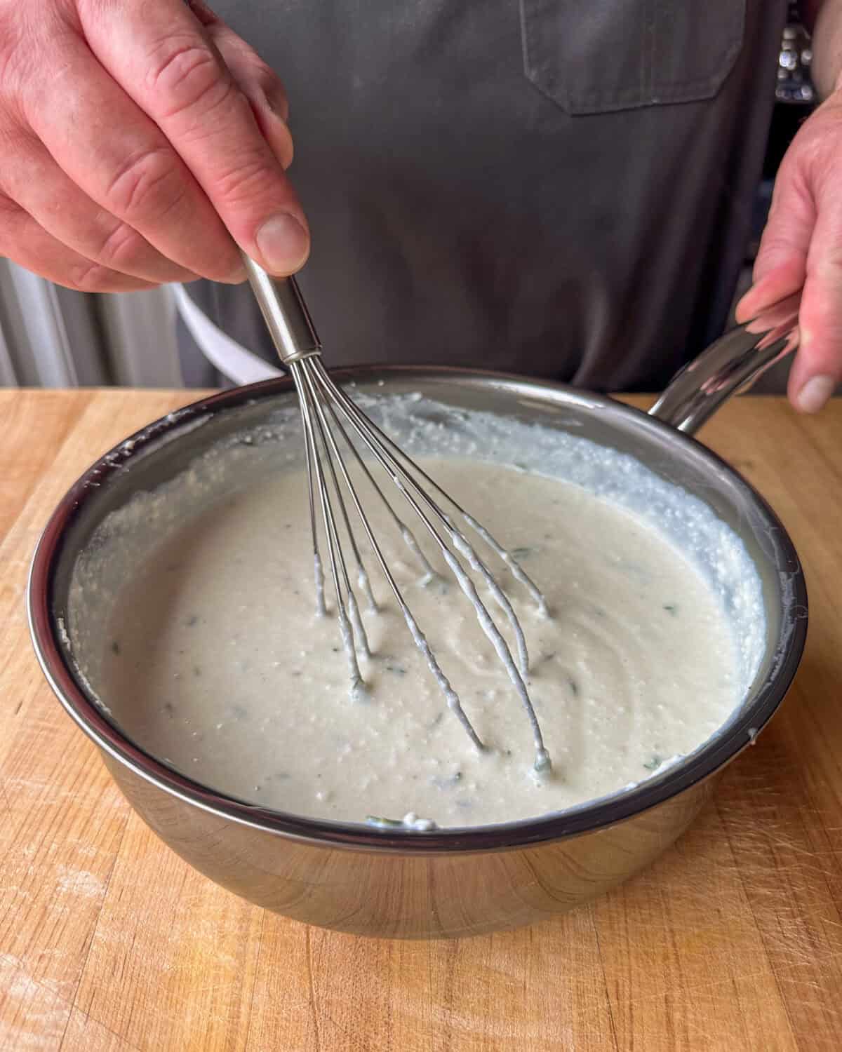 A pan béchamel sauce for a butternut squash lasagna recipe.