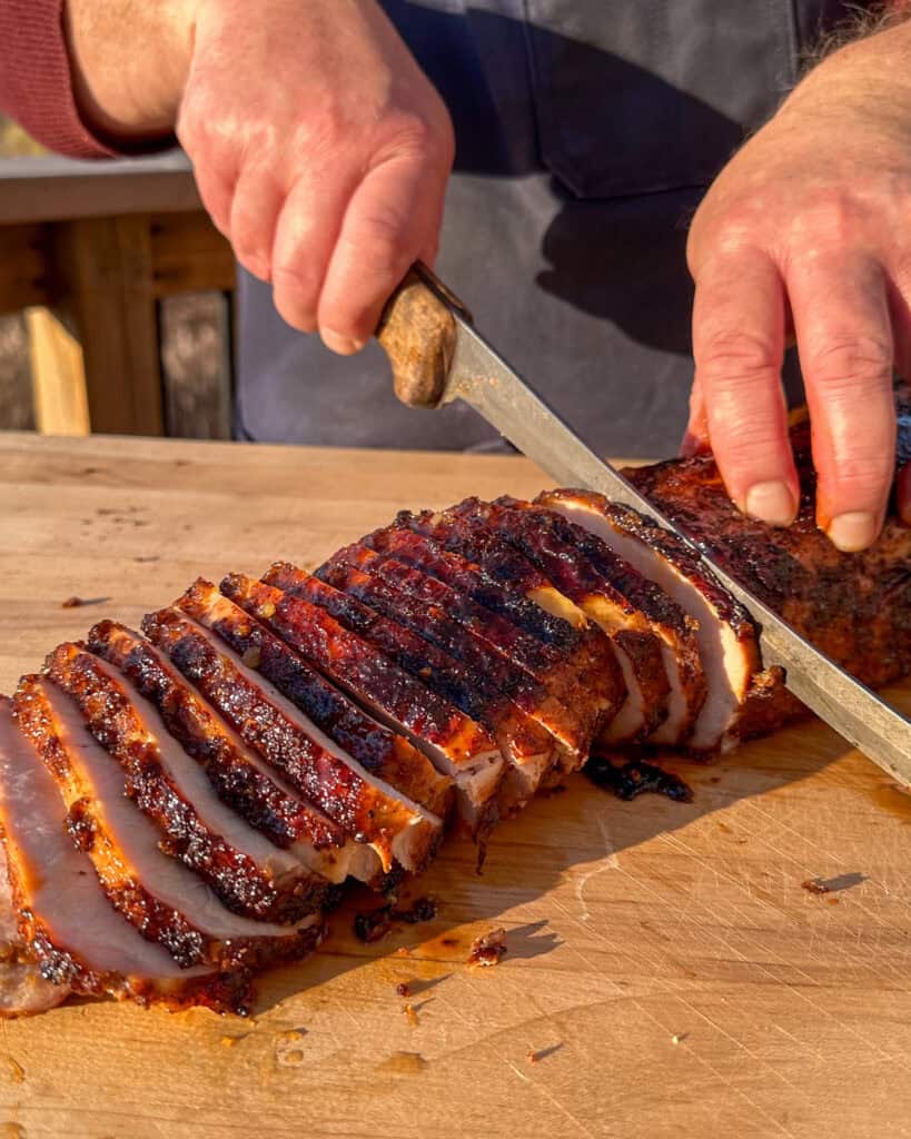 After resting, slice the pork loin roast.