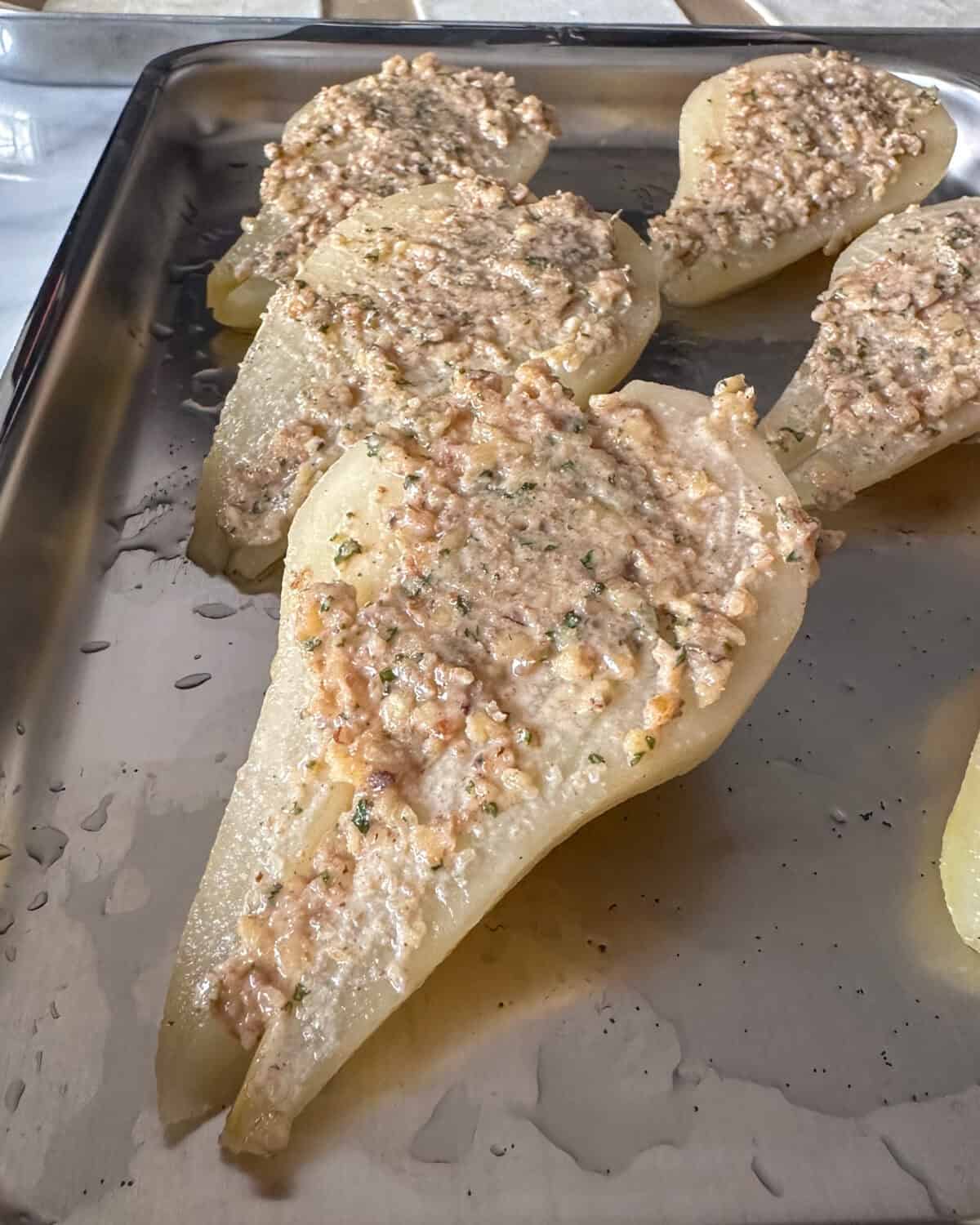 Pear halves filled with the nut filling.