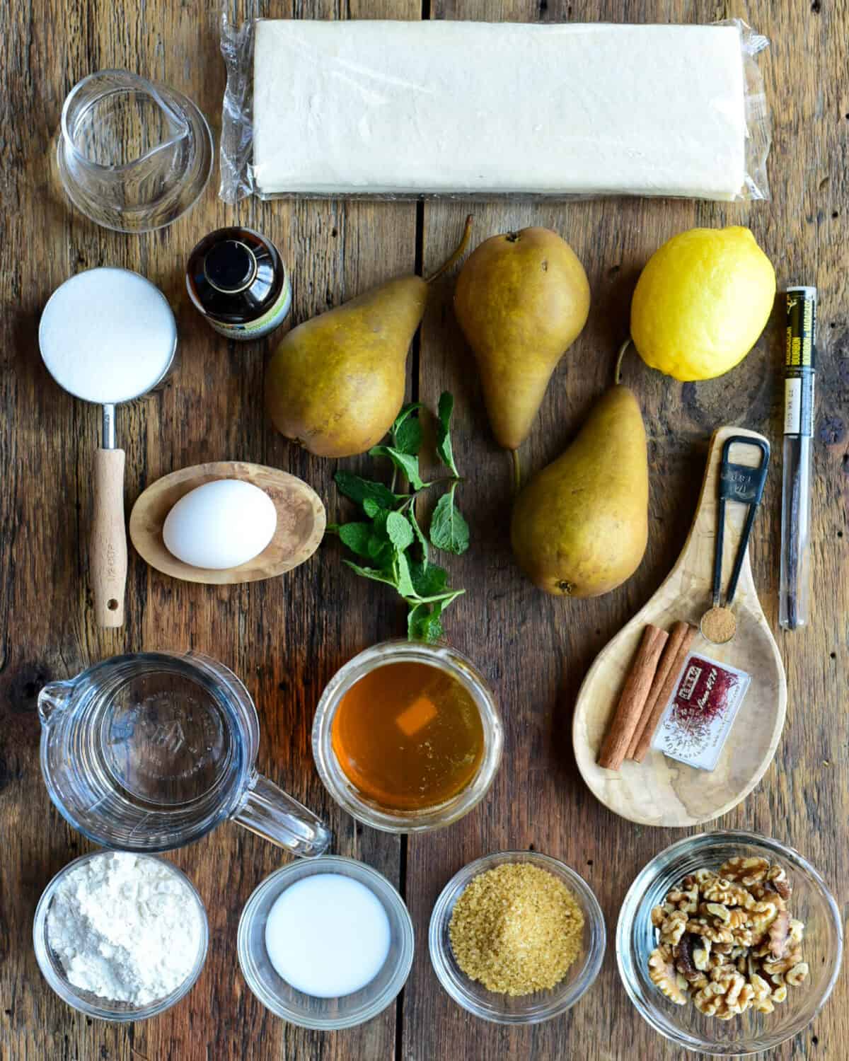 Ingredients for a poached pear puff pastry.