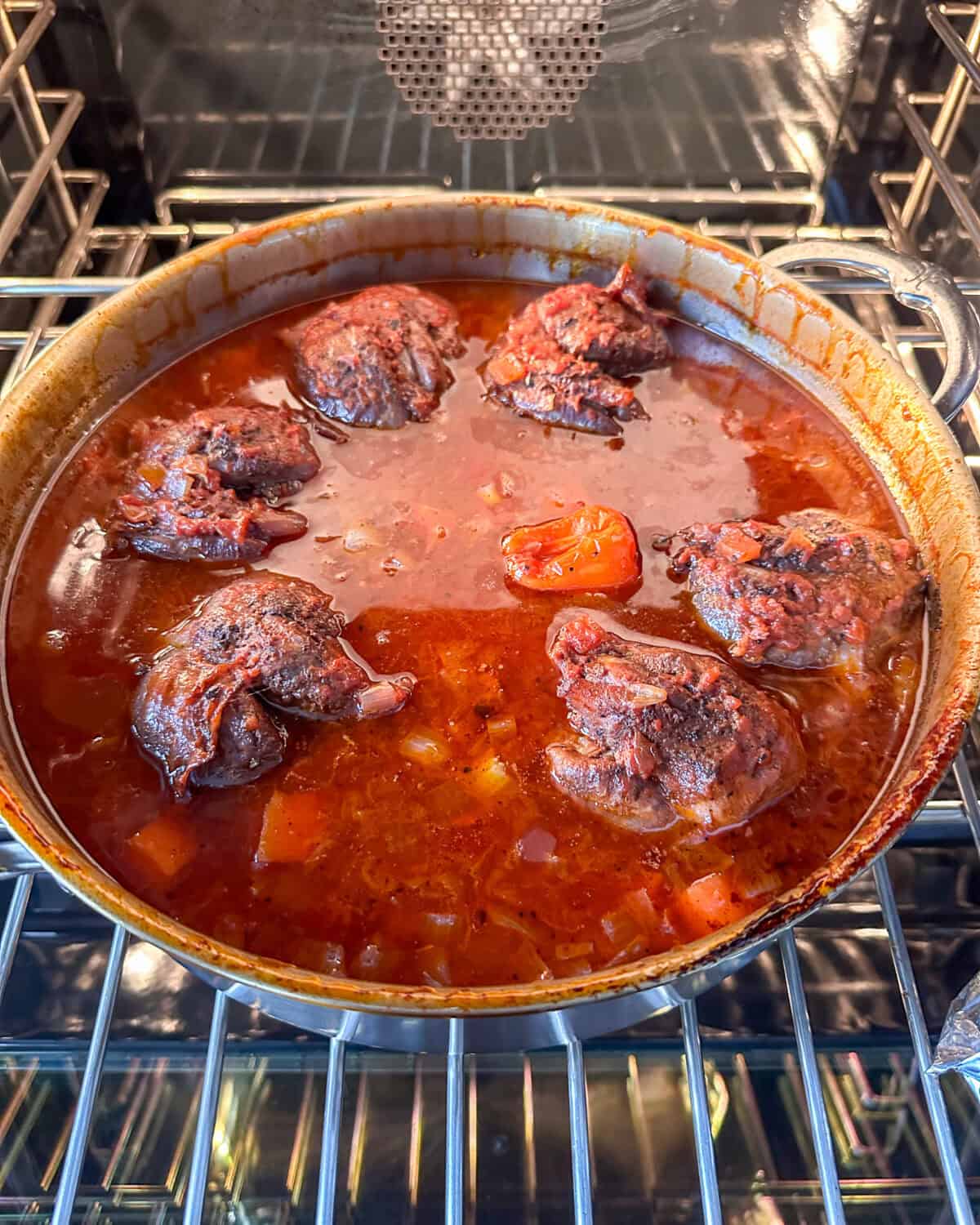 Braised lamb shanks in a tomato sauce.