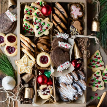 A Christmas Cookie box with a variety of cookies including basic sugar cookies, three ways.