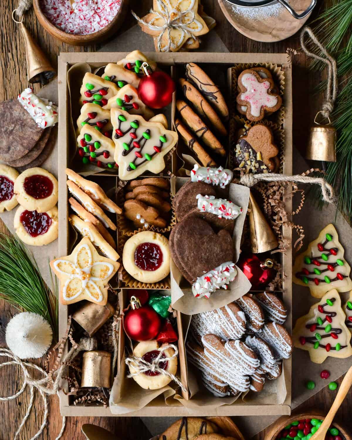 A Christmas Cookie box with a variety of cookies including basic sugar cookies, three ways.