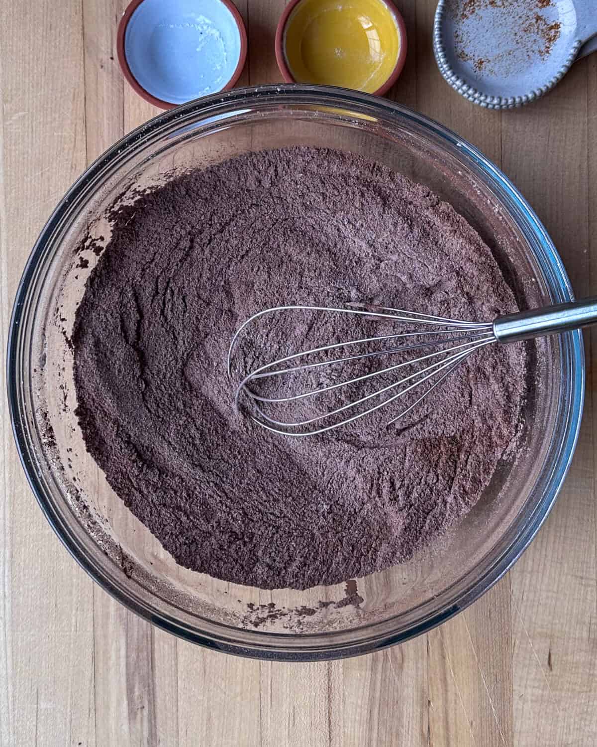 Sift together flour, cocoa, baking soda, baking powder, salt, and cayenne pepper into a large bowl. Then whisk in the sugar.