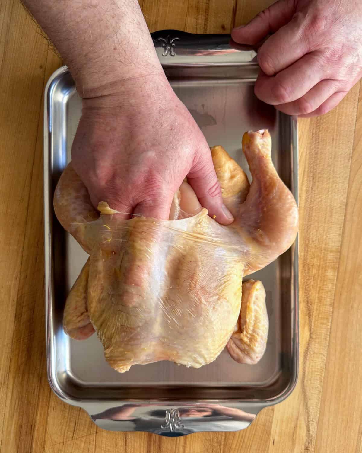 Gently run your fingers under the skin of the chicken breasts, to separate the skin from the meat.