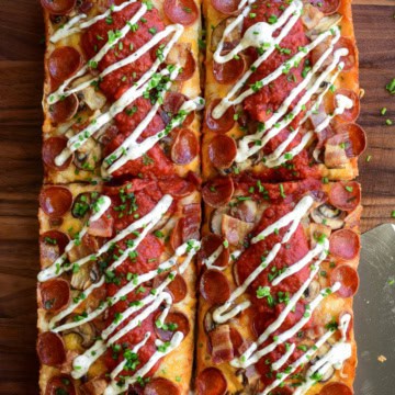 A Detroit-Style Pizza topped with Canadian pizza ingredients.