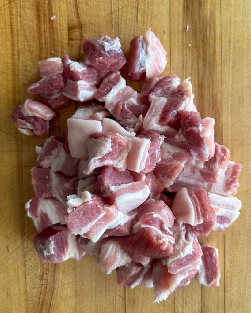 Slice the pork belly into 1 inch cubes.